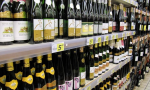 Compra solo tre bottiglie di vino al supermercato: multato